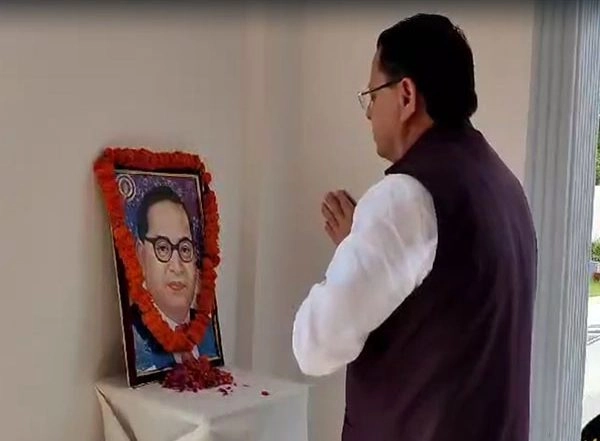 India News | Uttarakhand CM Pushkar Singh Dhami Pays Floral Tributes to BR Ambedkar on His Birth Anniversary