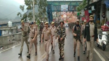 India News | J-K: Police, CAPF Conduct Flag Marches in Ramban Ahead of LS Election