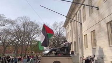 World News | Anti-Israeli Protesters Raise Palestinian Flag at Harvard University in Spot Reserved for US Flag