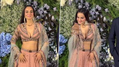 Ameesha Patel Flaunts Her Cleavage at a Wedding Event! Actress Stuns in Floral Embroidered Lehenga Featuring Deep V-Neck Blouse and Flowy Skirt (Watch Video)