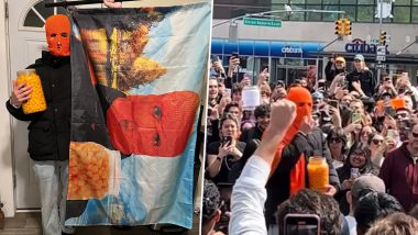 Crowd of Hundreds in New York City Amazed As ‘Cheeseball Man’ Devours an Entire Tub of Cheeseballs (Watch Videos)