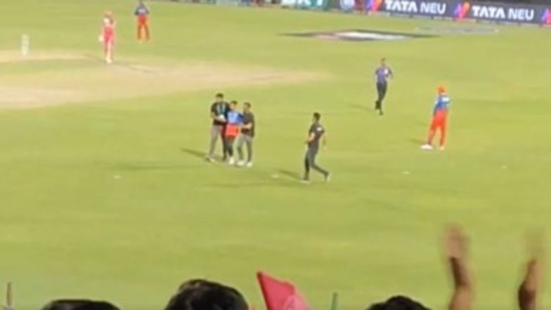 Fan Breaches Security To Hug Virat Kohli During RR vs RCB IPL 2024 Match at Sawai Mansingh Stadium, Video Goes Viral