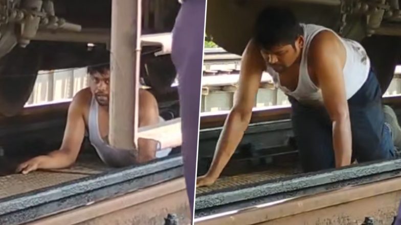 Andhra Pradesh: Assistant Loco Pilot Rajat Kumar Risks His Life, Crawls Under Train To Reset Alarm Chain After Visakhapatnam-Guntur Simhadri Express Halts on Bridge in Pithapuram (Watch Video)