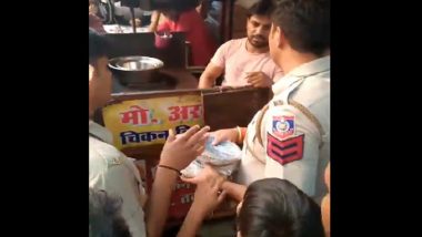 Biryani Served on Disposable Plates With Lord Ram's Photo in Delhi, Police Launch Investigation (Watch Video)