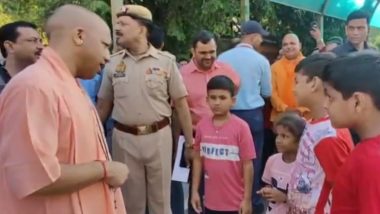 Yogi Adityanath's Gorakhpur Temple Visit: Uttar Pradesh CM Interacts With Children, Distributes Chocolates During Mandir Visit (Watch Video)