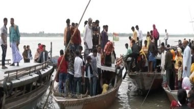 India News | LS Polls: Voters in Assam's Dhubri Use Boats to Arrive at Polling Booths