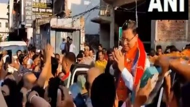 India News | Uttarakhand CM Dhami Receives Grand Welcome During Roadshow in UP's Bahraich