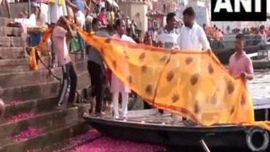 India News | Varanasi: BJP Workers Offer 400-metre Saree to Ganga River for PM Modi's Well-being, Longevity