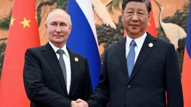 World News | Putin Arrives in China for State Visit as Two Nations Seek Deeper Cooperation