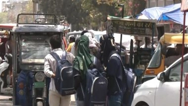 India News | Rajasthan Grapples with Scorching Heat, People Try to Protect Themselves While Going out