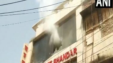 India News | Uttar Pradesh: Fire Breaks out at Cloth Showroom in Sitapur