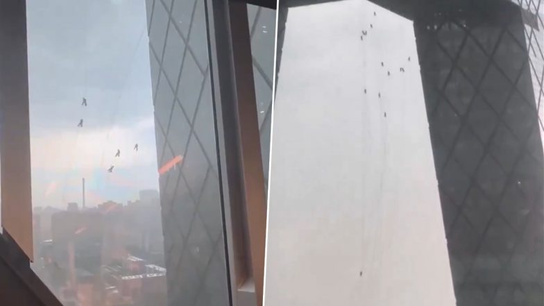 China: Glass Maintenance Workers Get Trapped in the Air in Beijing After China's Capital City Hit by Strong Winds, Terrifying Video Surfaces