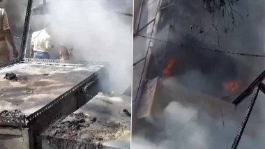 Uttar Pradesh Fire Video: Massive Blaze Erupts at Cosmetic Shop in Jhansi's Sipri Bazar Area, Viral Clip Shows Black Smoke Covering Skies