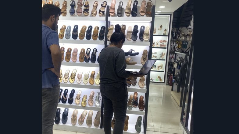 Peak Bengaluru Moment: Woman Shops for Shoes With Laptop in Hand to Attend Team Meeting Online, Pic Goes Viral