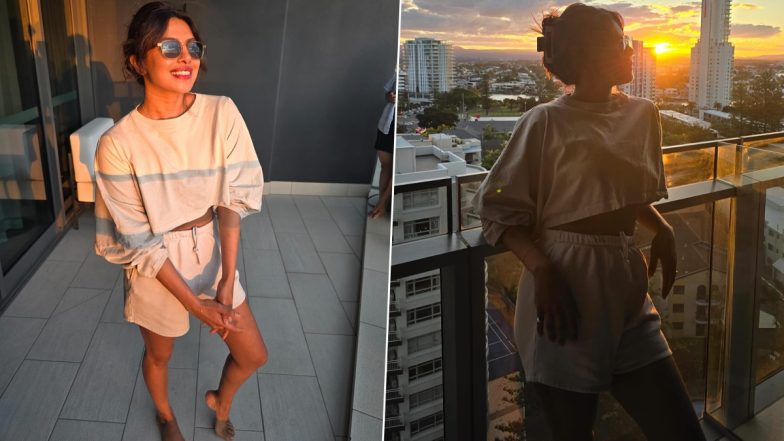 HOT! Priyanka Chopra Enjoys Sunset in Crop Sweatshirt and Shorts Ensemble (See Pics)