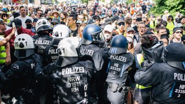 Germany Clashes: Two Police Officers Seriously Injured Amid Altercation During Mass Demonstration in Essen