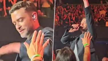 Justin Timberlake Reacts As He Swats Away Fan Trying To Grab His Jacket During Florida Concert