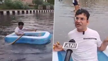 Delhi Rains: BJP Councillor Ravinder Singh Negi Rows Inflatable Boat on Waterlogged NH9 Highway To Protest Against AAP Government Over Flood-Like Situation in National Capital (Watch Video)