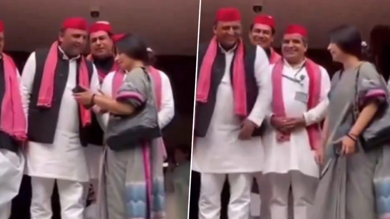 Akhilesh Yadav Bursts Into Laughter After Dimple Yadav Shows Him Something in Her Mobile Phone, Video of Couple   Sharing Light Moment Outside Parliament Goes Viral