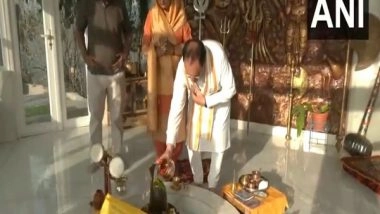 India News | Himachal: BJP President JP Nadda Offers Prayers at Temple Before Casting His Vote in Bilaspur