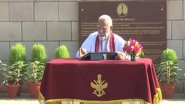 India News | PM-elect Narendra Modi Signs Visitor's Book After Laying Wreath at the National War Memorial