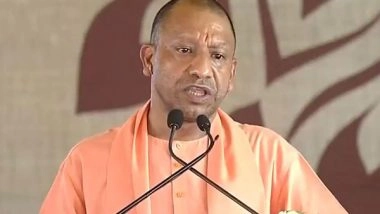 India News | CM Yogi Addresses Kisan Sammelan in Varanasi in the Presence of PM Modi