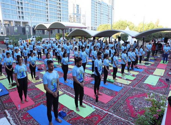 World News | Indian Embassy in Kuwait Pays Tribute to Fire Tragedy Victims During Yoga Day Event