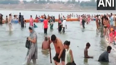 India News | Jyeshtha Purnima: Devotees Take Holy Dip in River Ganga in Uttar Pradesh, Uttarakhand; Offer Prayers