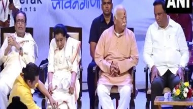 Entertainment News | Sonu Nigam Washes Asha Bhosle's Feet in Emotional Moment at Book Launch