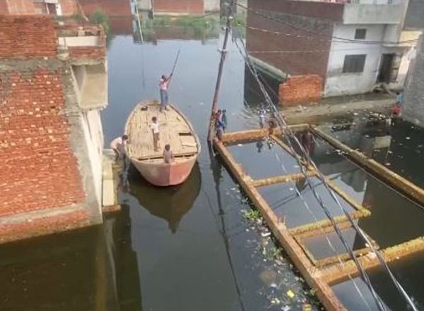 India News | Severe Waterlogging in Moradabad Forces Residents to Use Boats for Commute After Heavy Rains