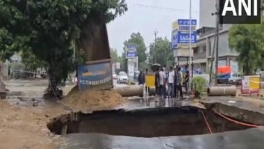 India News | As Road Caves in During Heavy Rain, Massive Sinkhole Created in Ahmedabad's Shela