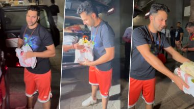 Varun Dhawan Blushes As He Distributes Sweets to Paparazzi on Welcoming a Baby Girl With Wife Natasha Dalal (Watch Video)