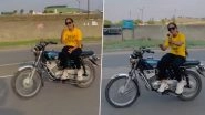 Pune Woman's Dangerous Bike Stunt Viral Video: Young Biker Rides Bike Hands-Free While Performing on Bollywood Song, Sparks Outrage Online (Watch)