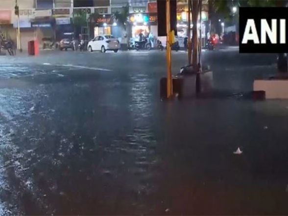 India News | Heavy Rain Continues to Lash Gujarat, Causing Road ...