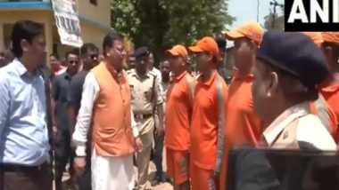 India News | Uttarakhand CM Pushkar Singh Dhami Interacts with Rescue Personnel in Flood-affected Khatima