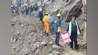 India News | Uttarakhand: SDRF Helps Pedestrians Cross Road as Badrinath Highway Opens