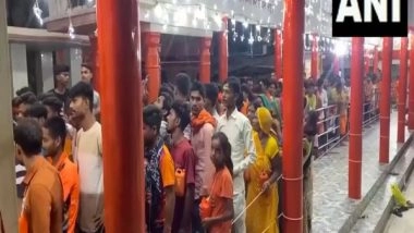India News | Uttar Pradesh: Devotees Throng Lord Shiva Temple on First Day of 'Sawan'