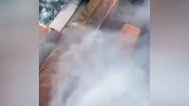 India News | Battling Extreme Weather, Indian Coast Guard Continues Efforts to Douse Fire Onboard Merchant Ship