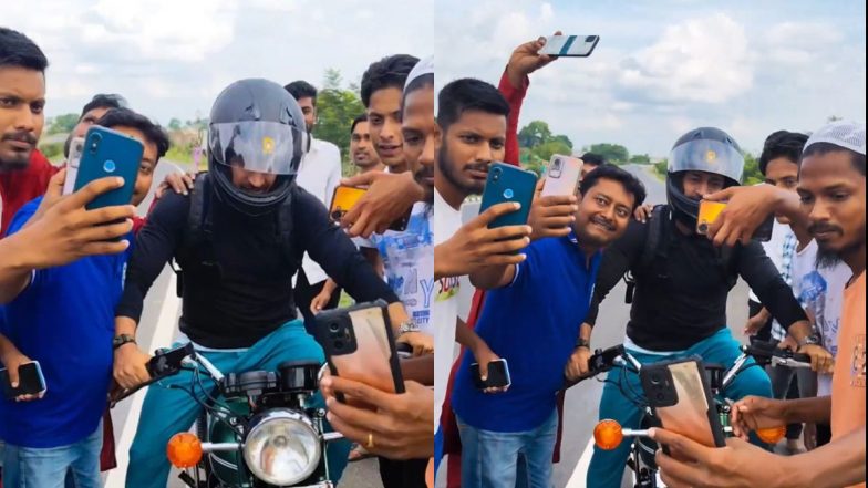 MS Dhoni Clicks Selfies With His Fans While Riding Bike on Roads of Ranchi, Video Goes Viral