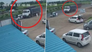 Pune Road Accident: 1 Dead, 2 Injured After Speeding Truck Crashes Into Car Parked at Roadside on Pune-Solapur Highway, Shocking Video Surfaces