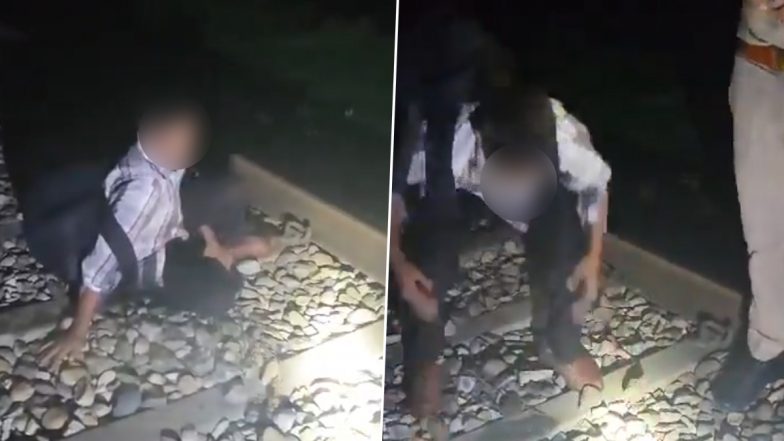 Drunk Man Miraculously Survives After Being Run Over by Train in Uttar Pradesh, Police Found Him Sleeping on Tracks (Watch Video)