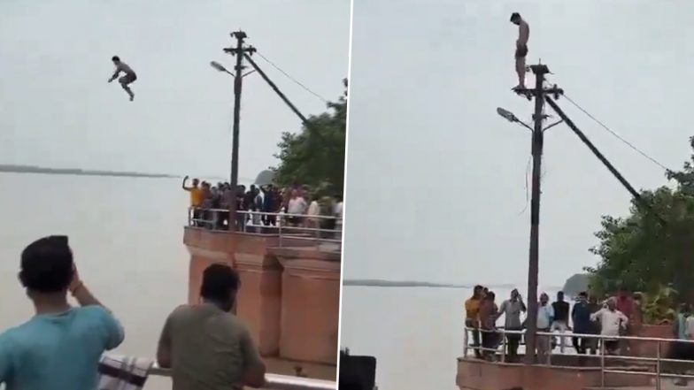 Kanpur: Youth Leaps From Electric Pole Into Ganga River For Reel at Bhairav Ghat in Kanpur, Dangerous Stunt Video Goes Viral