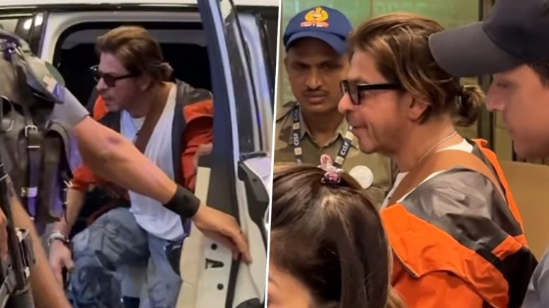 Shah Rukh Khan Makes Stylish Appearance at the Mumbai Airport in Orange Hoodie As He Jets Off to Undisclosed Location (Watch Video)