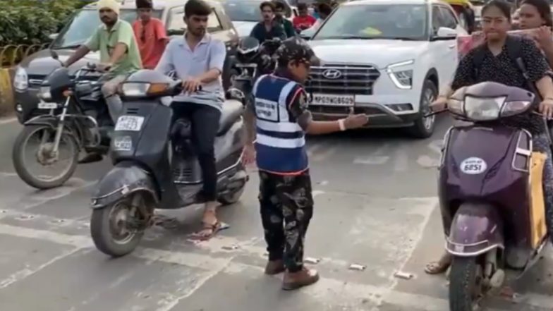 Indore: 10-Year-Old Boy, Aditya Tiwari Sings Self-Composed Songs to Promote Traffic Rule Awareness in Madhya Pradesh (Watch Videos)