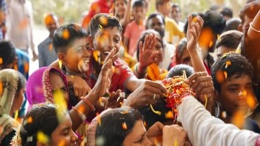 India News | MP: Women Tie Rakhi to Union Minister Shivraj Singh Chouhan in Budhni