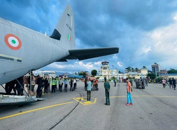 World News | IAF Aircraft Carrying Mortal Remains of 25 Indian Pilgrims Killed in Nepal Lands at Jalgaon Airport