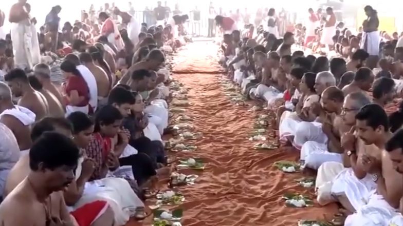 Kerala: Thousands Participate in Karkidaka Vavu Bali Ritual at Shankumukham Beach, Offer Rice Balls at Riverbank to Appease Spirits of Ancestors (Watch Video)