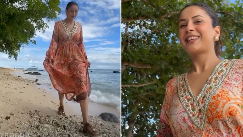 Shehnaaz Gill Shares Beautiful Glimpse of Beach Vacation, Actress Looks Relaxed in Flared, Multi-Coloured Dress (Watch Video)