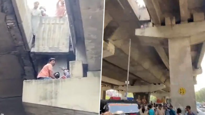 Noida: Girl on Scooty Falls on Pillar From Elevated Road Gap After Being Hit by Vehicle in Sector 25, Rescued (Watch Video)