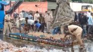 Guntur: Police Place Seized Alcohol on Ground for Disposal, Locals Grab Liquor Bottles and Flee (Watch Video)